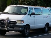 Words failed me when I saw this van. Perhaps its owner had good reasons for affixing a skeleton to the front and including another inside. Perhaps they had good reasons for the splashes of red paint. (Although I can't imagine what those good reasons may be ... I snapped this photo in August, long before Halloween's approach.)
